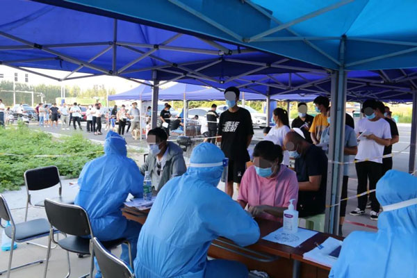 夜战疫情--周口港区医院承担郑州返周人员免费核酸检测工作